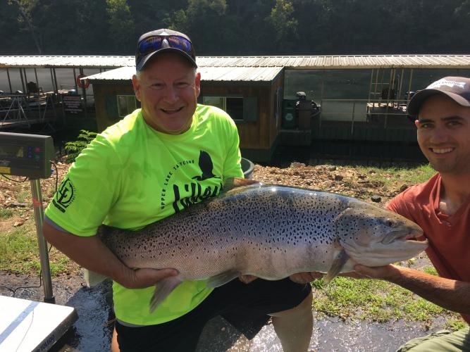 Bill Babler and friend Ryan Titus pose with a new state record brown trout.