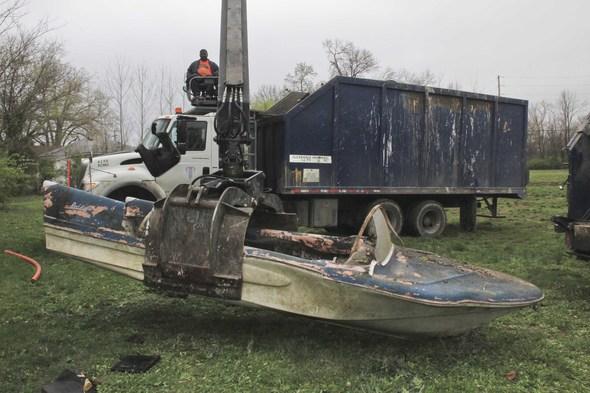 Fiberglass boat was among some of the trash volunteers picked up over the weekend.