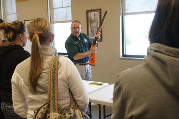Hunter Education instructor teaching a class about gun safety.