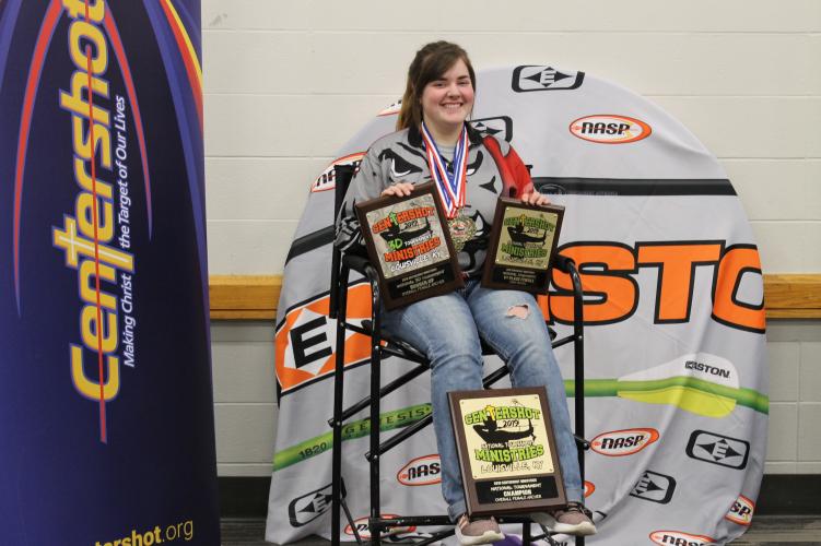 Ivy Walton poses with her trophies at the NASP Eastern National Tournament in Louisville, Ky.