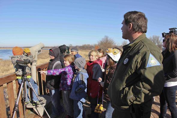 Eagle Days visitors looking through spotting scopes in hope to find eagles.