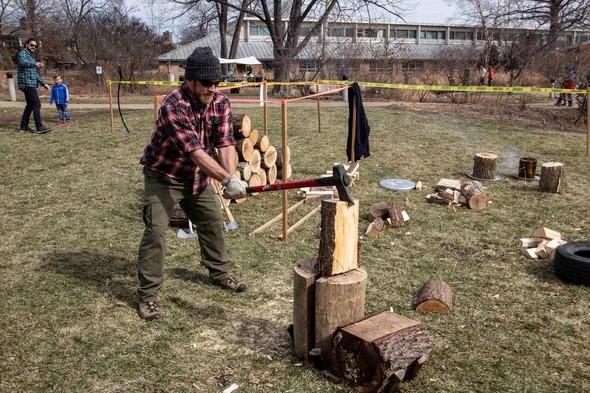 A man chops wood