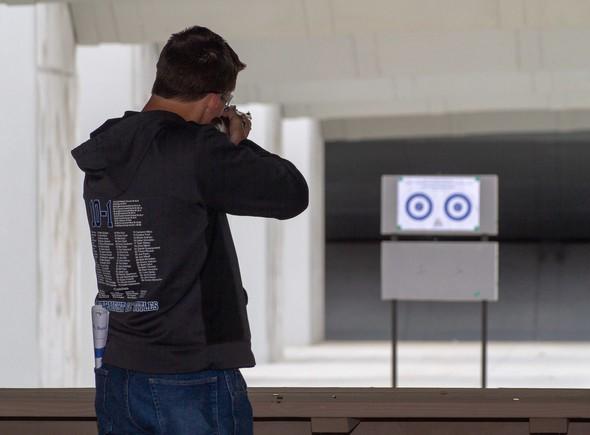 man shooting rifle at Busch Shooting Range