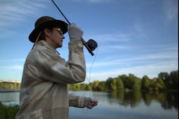 person fly fishing