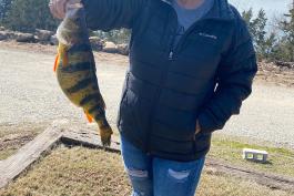Sharon Christopher holds her state record yellow perch