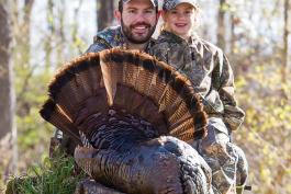 Jake and his daughter with her first turkey