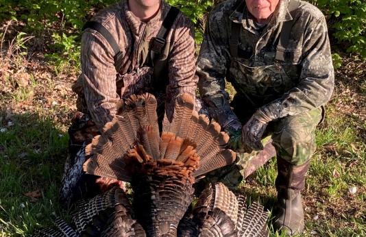 Clayton Graham and John Eisenbath with harvested wild turkey