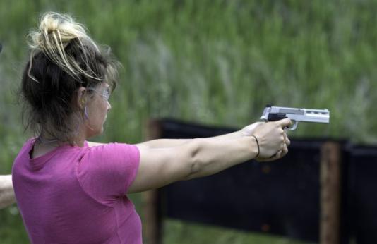woman shooting handgun