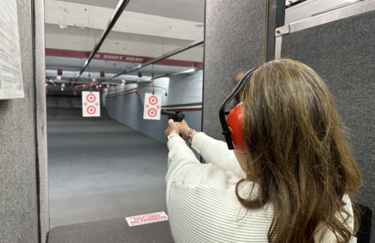 Woman fires handgun at shooting range