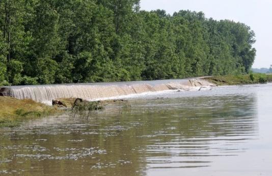 Water flowing over the levee in 2013