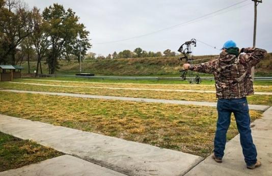 Someone shooting a bow.