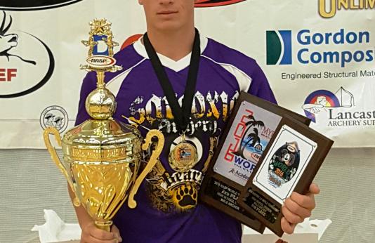 Caleb Stillians with his trophies from the 2016 NASP World Archery Tournament