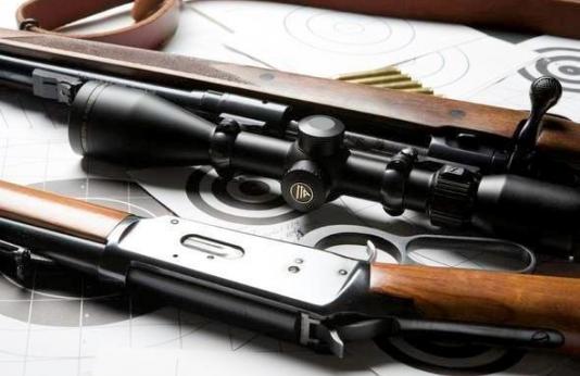 Closeup pic of rifle and shotgun