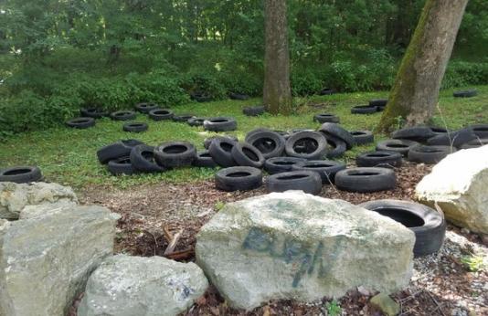 illegal dump of tires at Stringtown Bridge Access