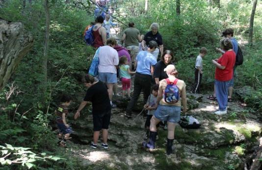 MDC staff take visitors on a nature hike