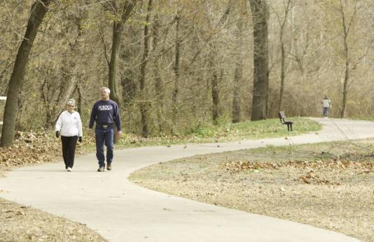 A couple takes a nature walk in St. Joseph.